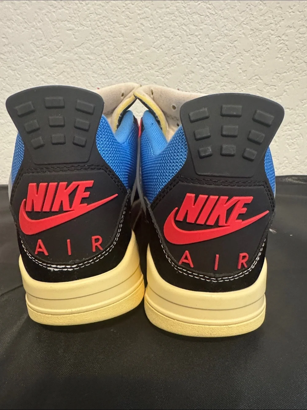 Nike Air Jordan 4 Retro UN/LA - Black/Blue/Red/Cream